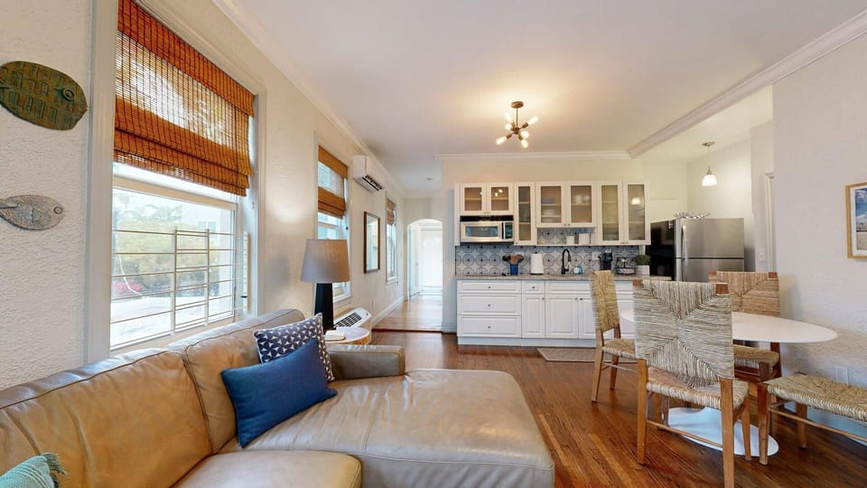 Living Area, Smart TV, Dining, Kitchen, Windows overlooking Washington Ave and Courtyard