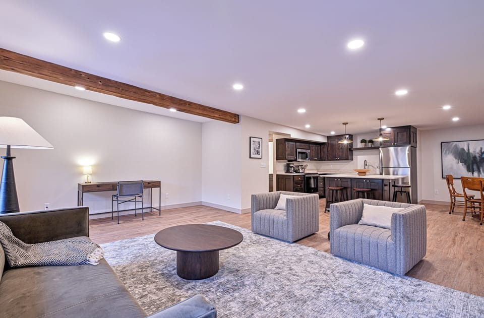 Living room, desk area & kitchen.