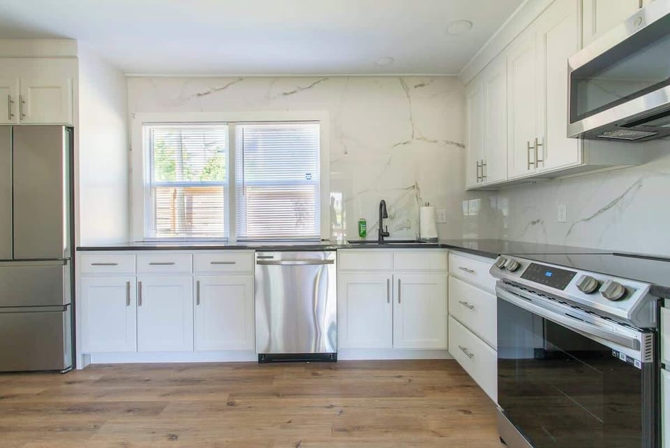 Gourmet Kitchen: Whip up your favorite meals in this sleek, modern kitchen with stainless appliances!