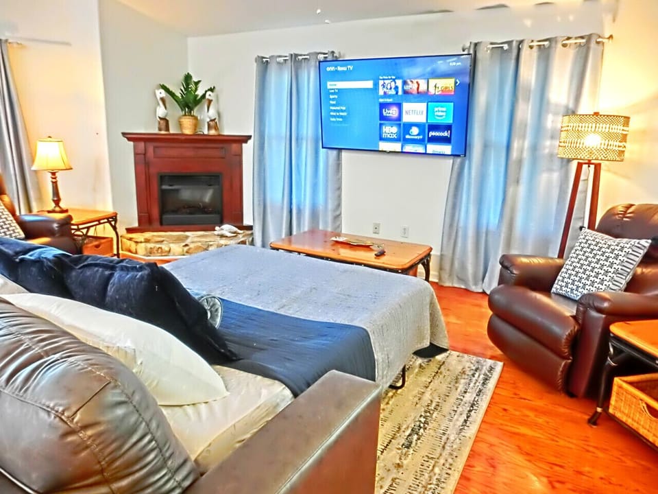 Queen sleeper sofa provides extra sleeping space for your group.