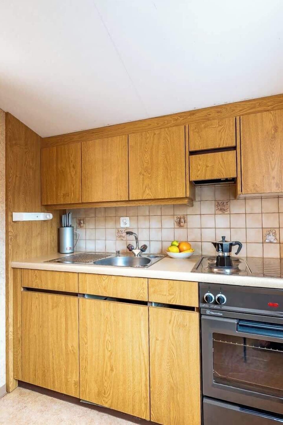 Spacious bedroom with comfortable double bed and sitting area
