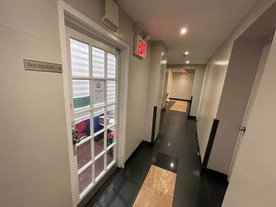 Please come to reception # 4. This is our check in /housekeeping and Luggage storage room. We are located on main floor. 