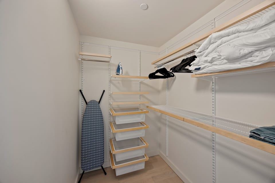 Unpack with ease in the large, organized walk-in closet.