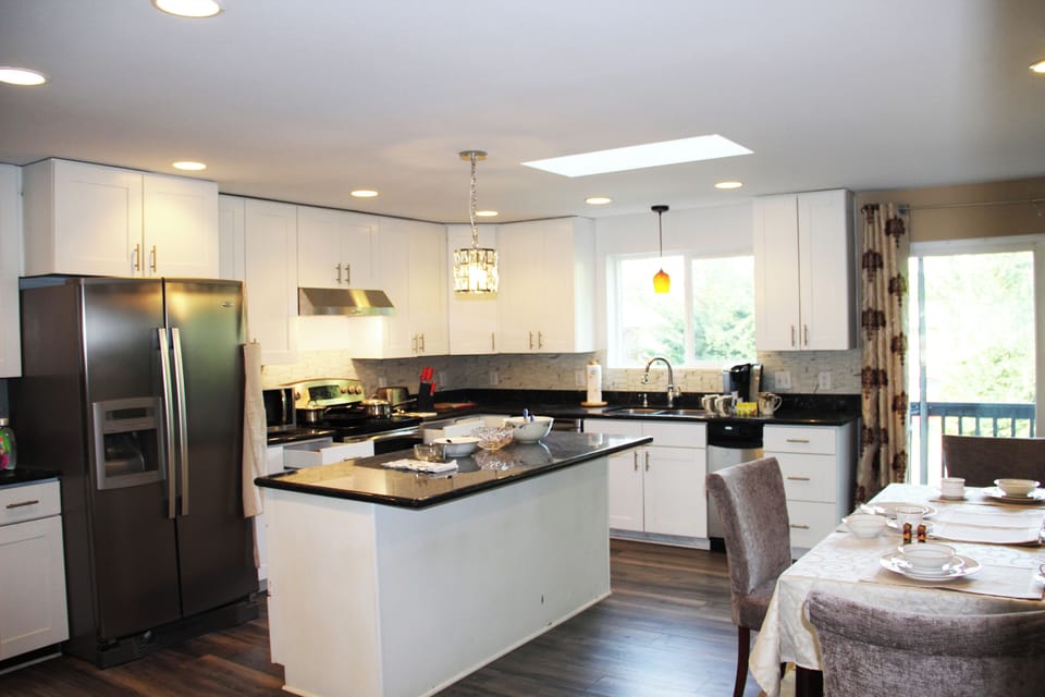 Fully stocked kitchen with stainless-steel appliances. Perfect for family dinner