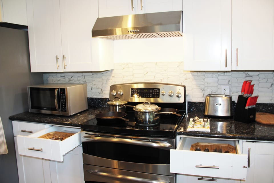 Fully stocked kitchen with stainless-steel appliances. Perfect for family dinner