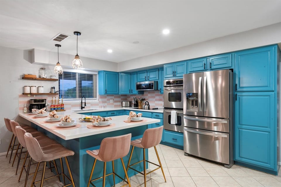 Fully Equipped Kitchen And Counter Top Seating