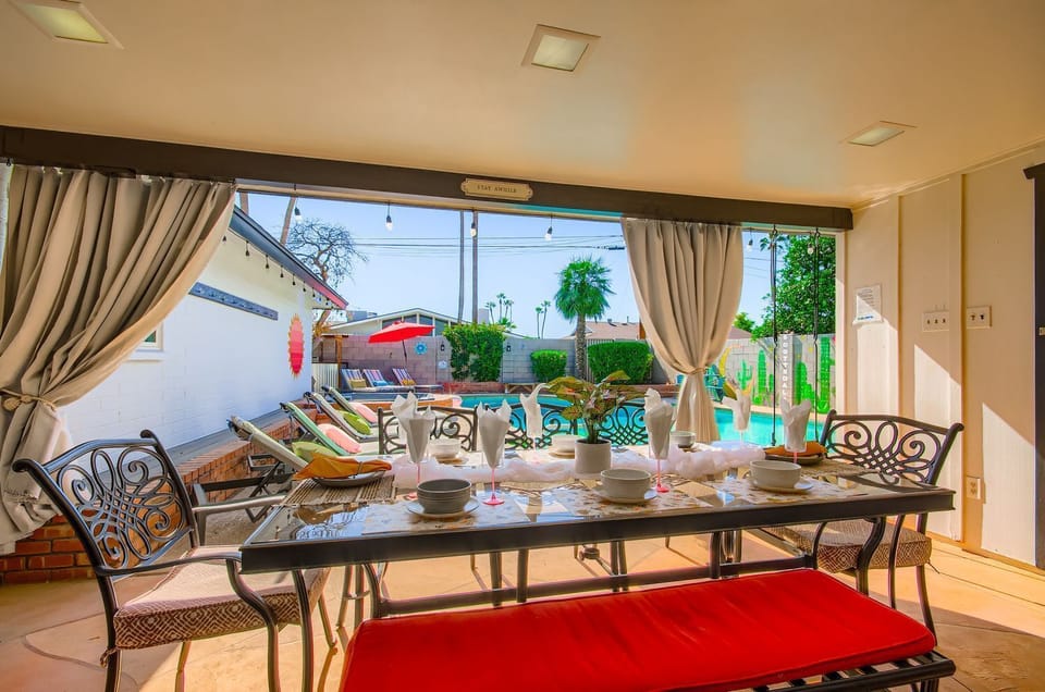 Outdoor Table For 10 Overlooking The Pool