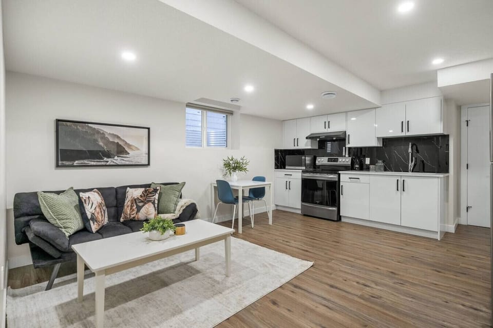 Living room with a cozy couch and TV with an Amazon Firestick.