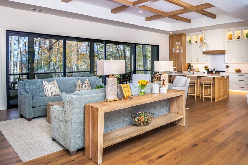 Open Layout | Stylish Living Space | Chef’s Kitchen | Forest Views