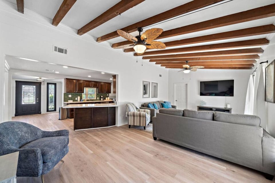 This bright and airy living room is the heart of the home