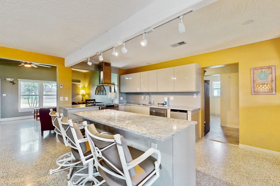 Fully equipped kitchen with everything you need and a breakfast bar that seats three