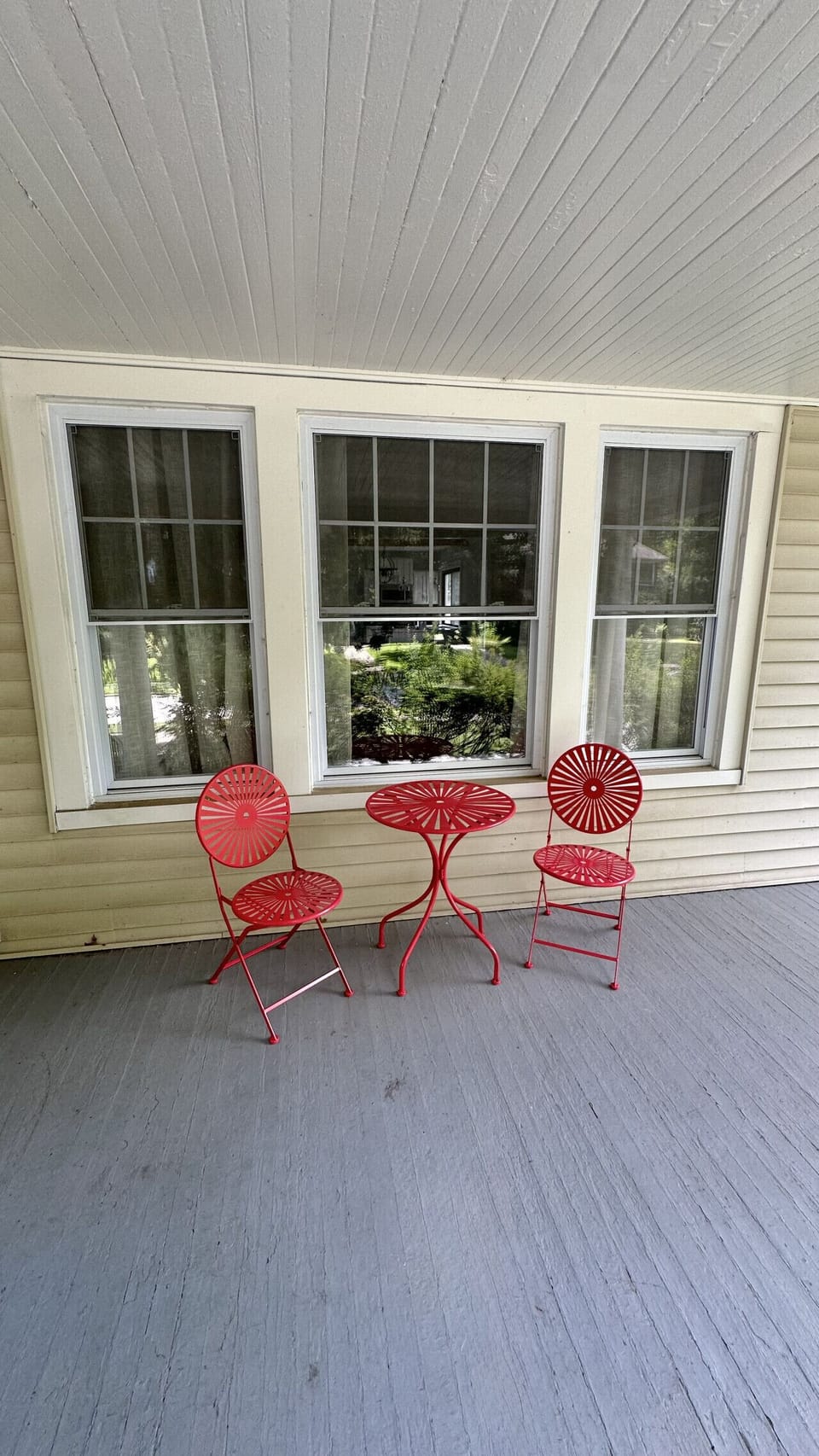 Relax outdoors on your private front patio, a welcoming space to enjoy fresh air, morning coffee, or an evening conversation.