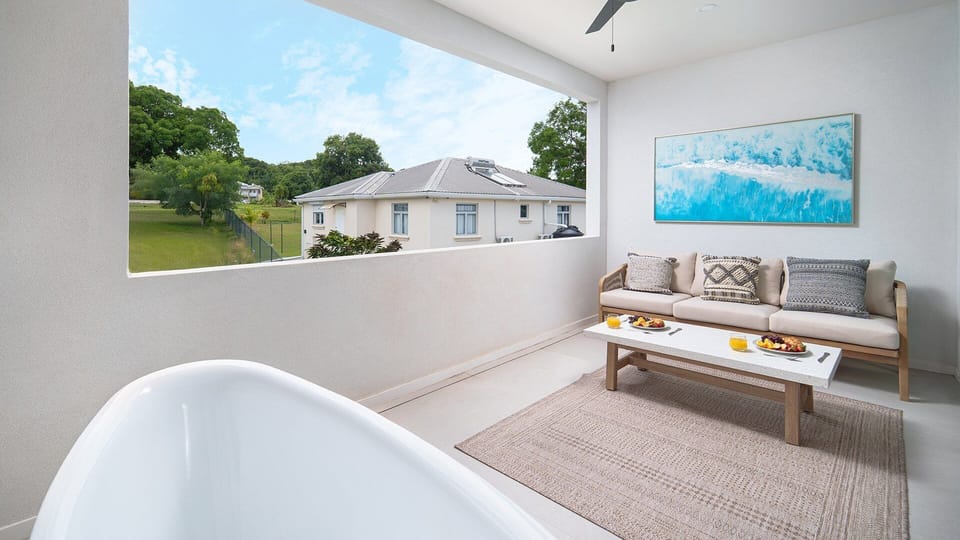 Bathrooms are crisp and elegant, designed for both practicality and indulgence.