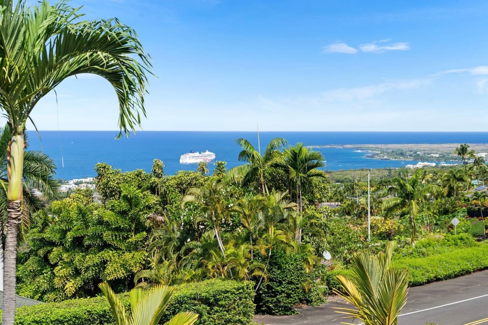 Breathtaking panoramic views of the ocean, city lights, and Kona's famous sunsets
