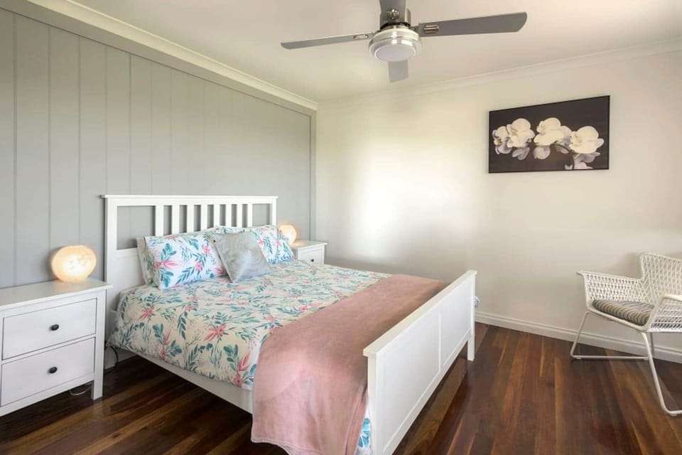 A cosy, bright bedroom with stunning views.