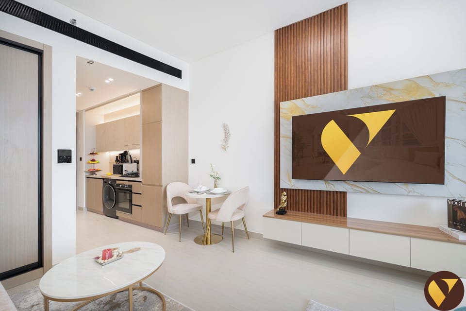 Luxury Studio, Balcony, City View | Living area | 65-inch Smart TV with satellite channels