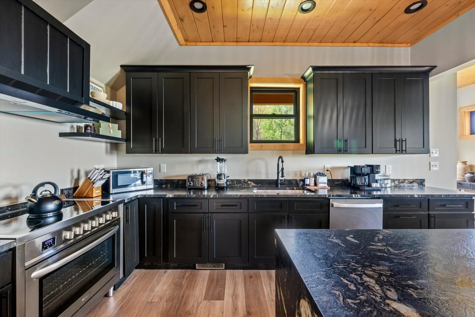 Spacious kitchen with everything you need for your stay.