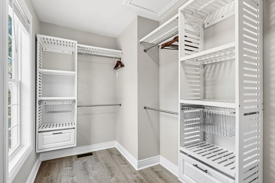 Unpack, settle in, and make yourself at home - this walk-in closet has room for it all.