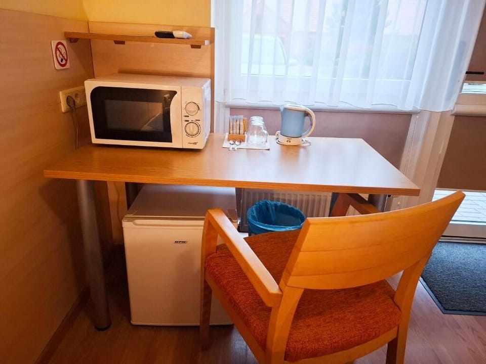 Standard Double Room | Living area | TV