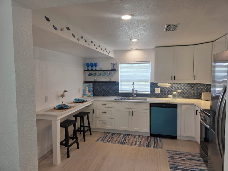 All new kitchen with breakfast counter for 2