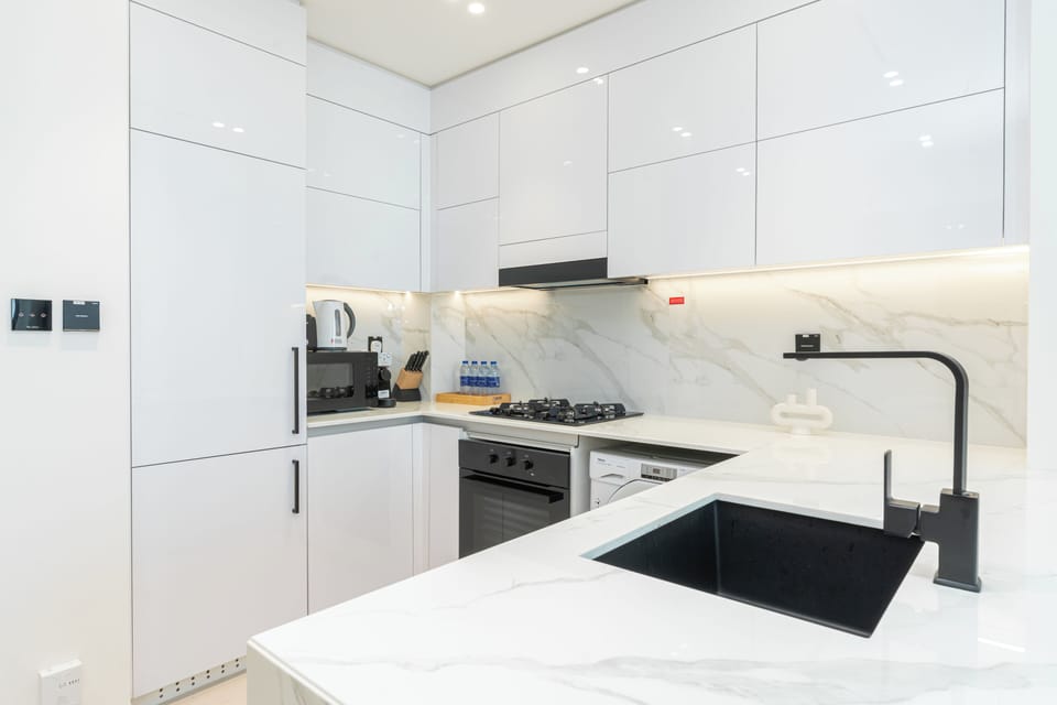 Exclusive Apartment, City View | Private kitchen | Full-size fridge, microwave, oven, stovetop