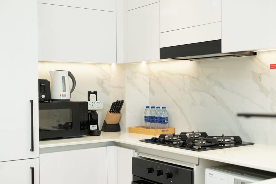 Exclusive Apartment, City View | Private kitchen | Full-size fridge, microwave, oven, stovetop