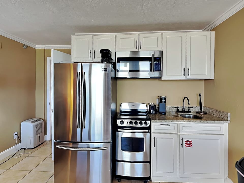 Fully Equipped Kitchen with Stainless Steel Appliances