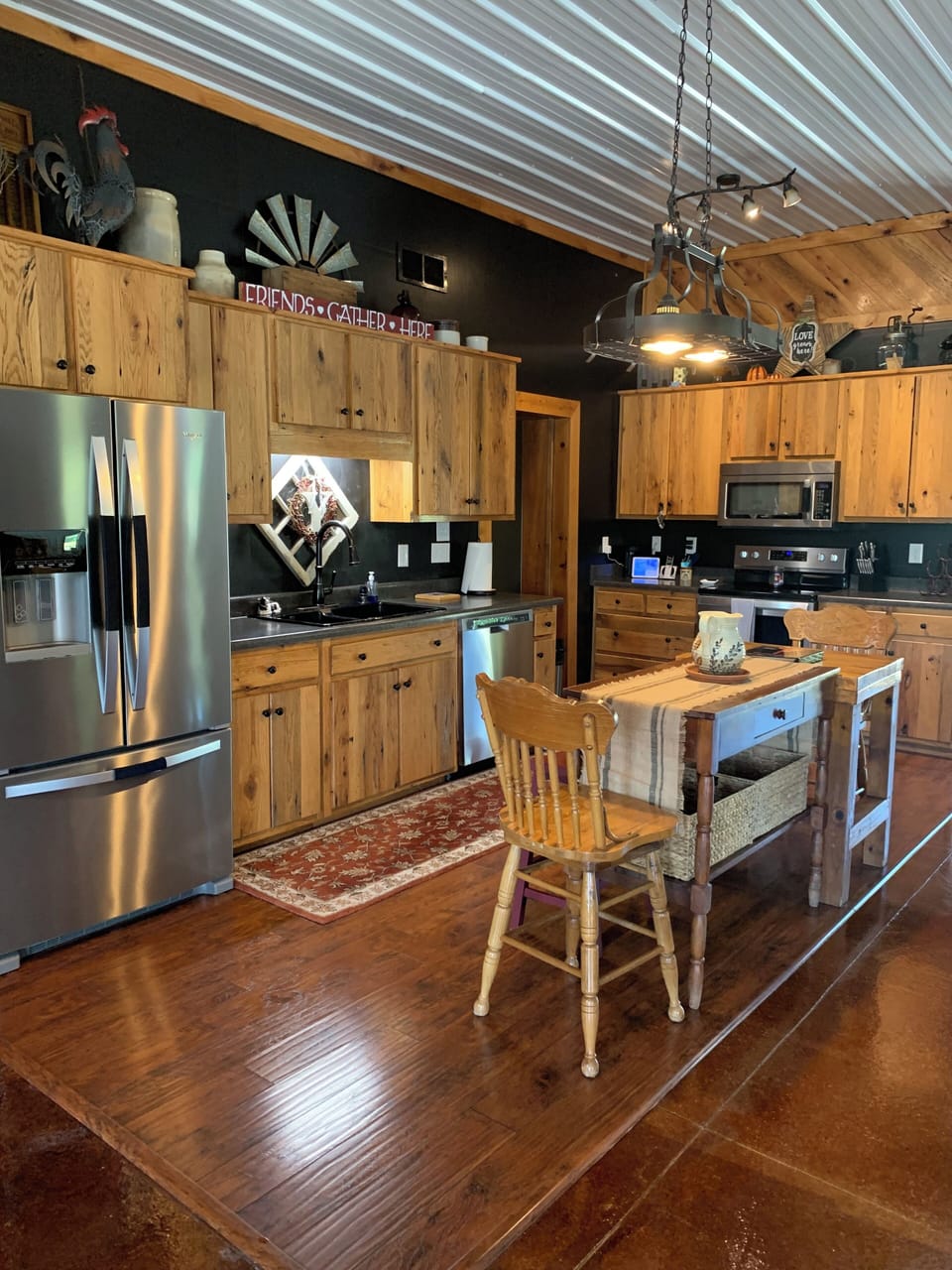 Kitchen area with rustic island.