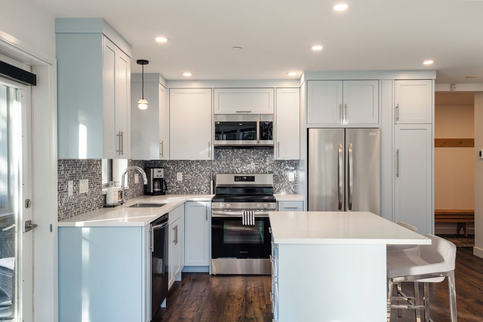 Kitchen - cook all your favorite meals with ease in this fully equipped kitchen with bar seating