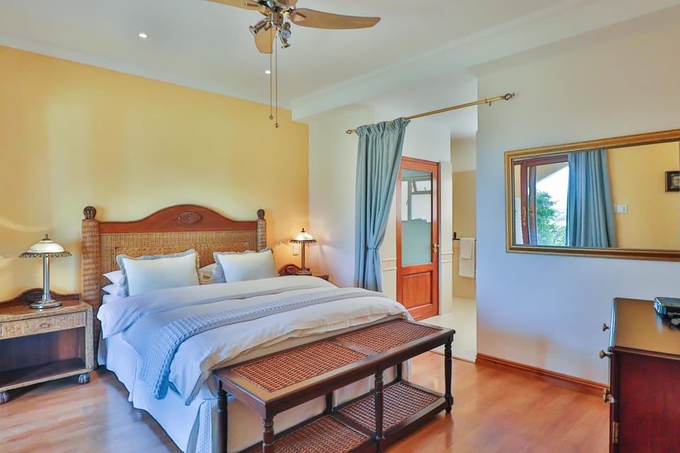 Deluxe Double Room, Patio, Sea View | Minibar, in-room safe, individually decorated, individually furnished