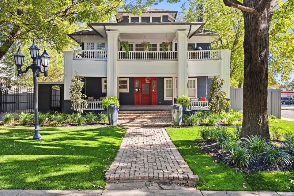 Exterior view showcasing The Grand Manor, situated on the first floor. With over 1,750 square feet of interior space, it boasts a generously sized terrace balcony, offering a seamless blend of indoor luxury and outdoor living.