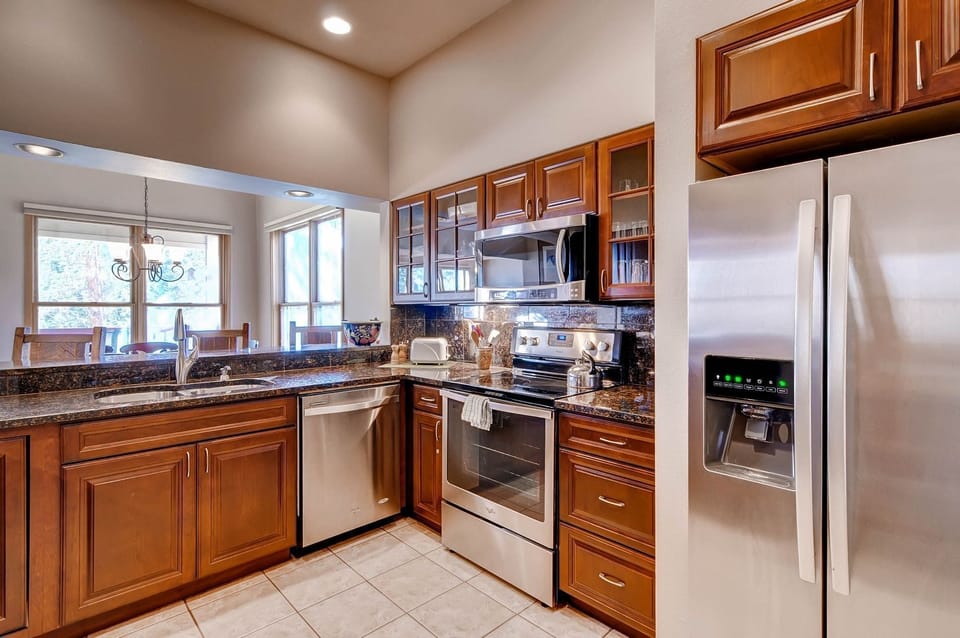 Bright and functional kitchen ideal for preparing hearty breakfasts before a day at Keystone Resort.
