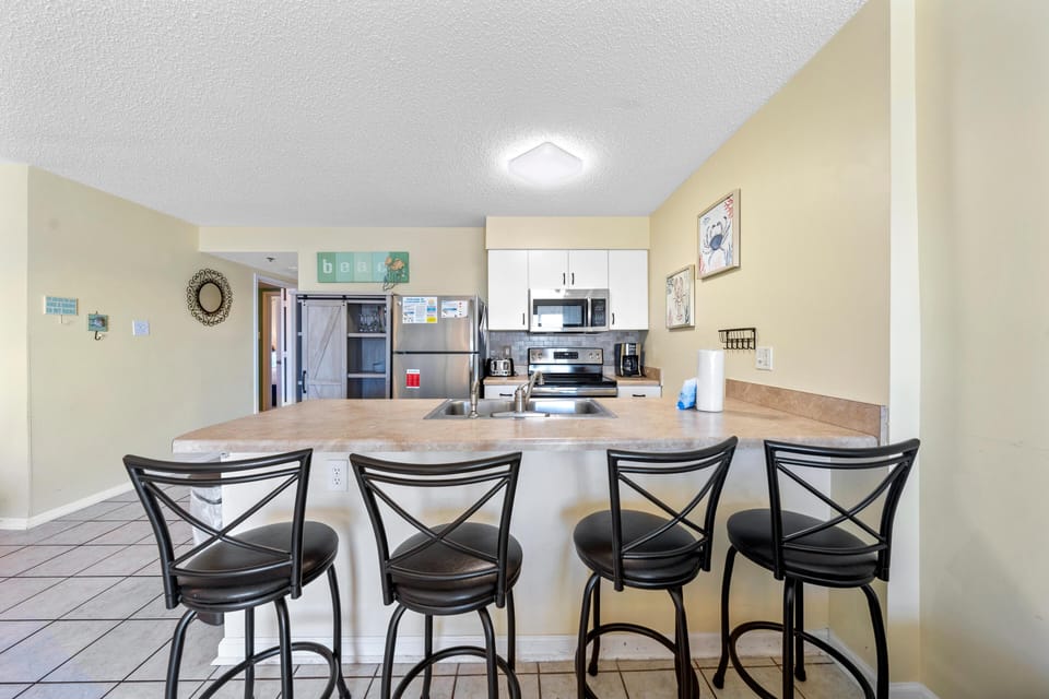 Condo, Multiple Beds (Tradewinds 1106 - Austin Family Retre) | Private kitchen | Oven, toaster