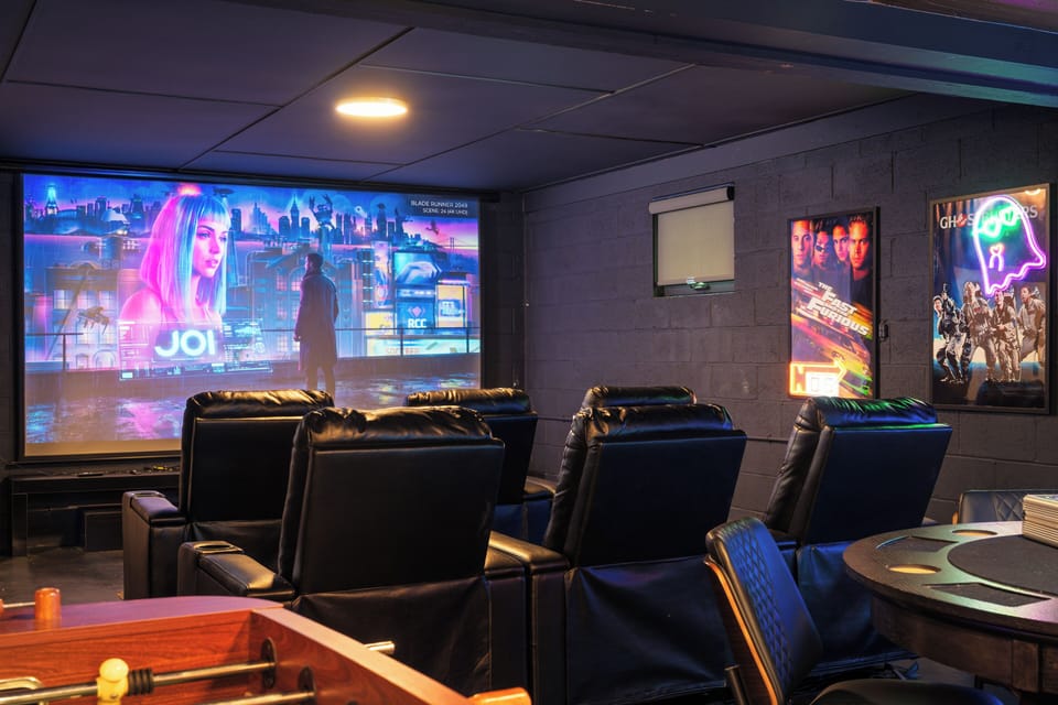 Home theater den with plush recliners and surround sound, the ultimate spot for movie night