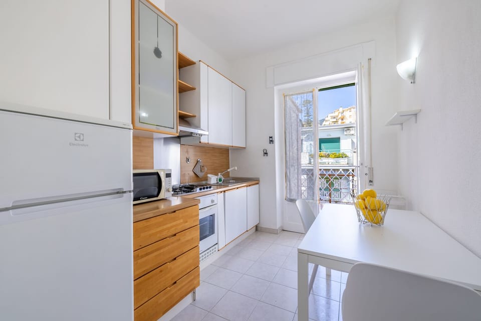 Apartment, Multiple Beds, Pets Allowed, Partial Sea View | Private kitchen | Fridge, microwave, oven, stovetop