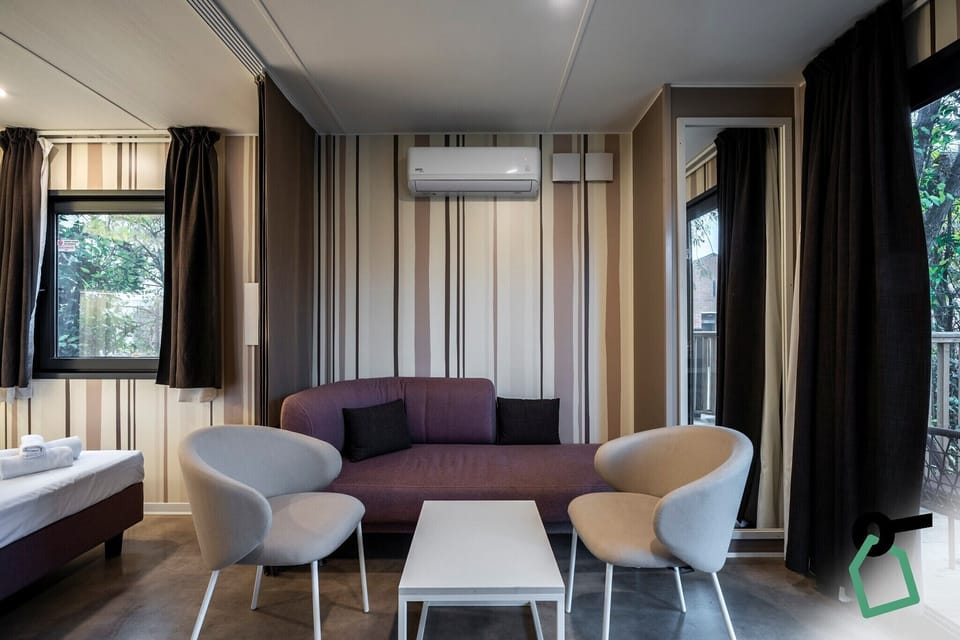 Executive Mobile Home | Living area | TV