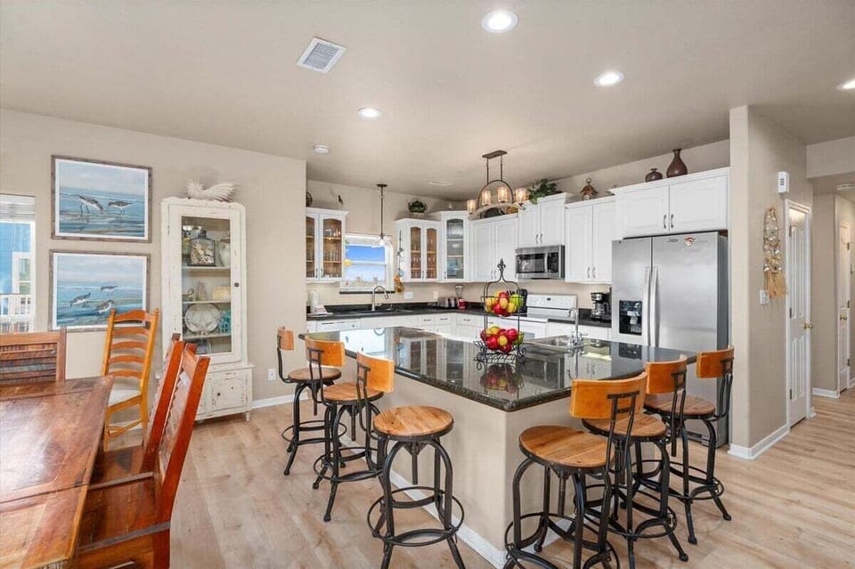 Fully equipped kitchen with stainless appliances and spacious countertops