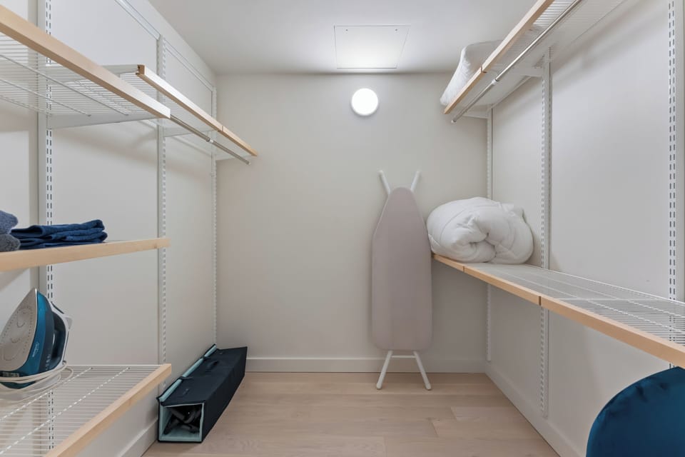 Store and organize your entire wardrobe in the walk-in closet space.