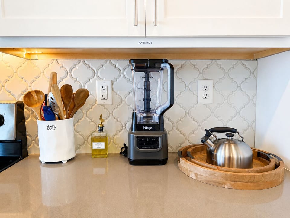 The kitchen is stocked and ready for quick breakfasts or home-cooked meals.