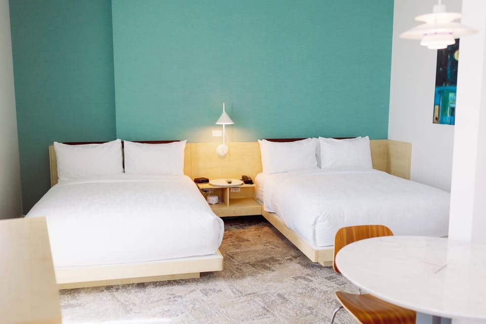 Bright and airy, this beautifully designed room offers a peaceful sanctuary with chic decor and ample space to relax after a day in the city.