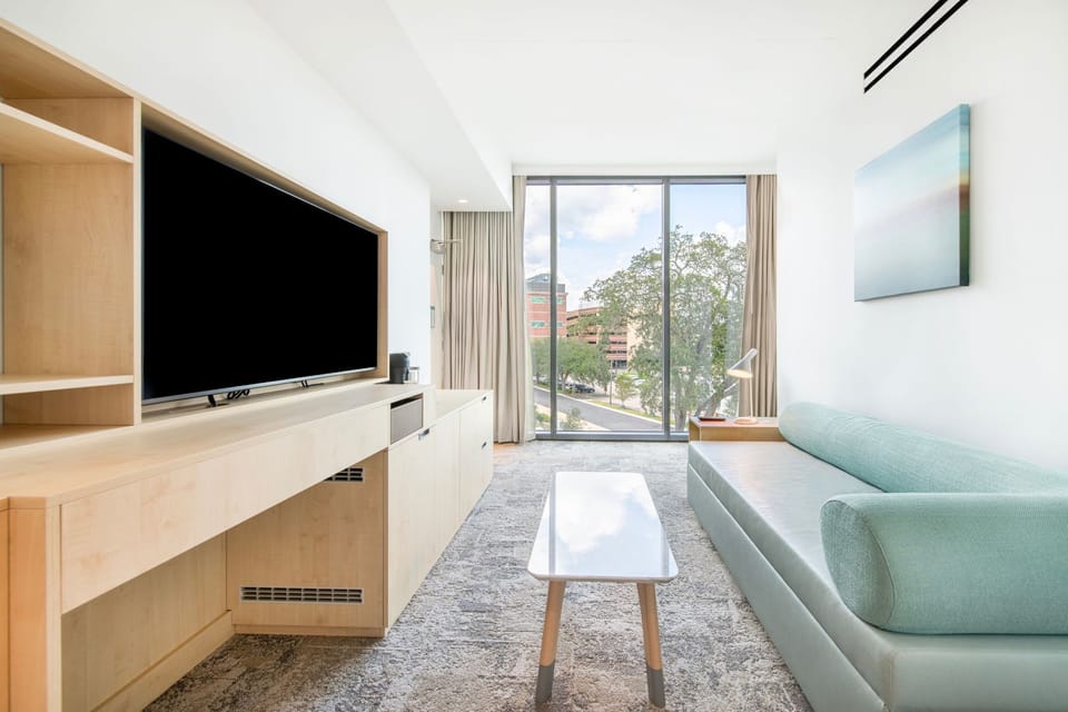 Bask in natural light and contemporary design in your spacious suite, complete with stunning views of the lakeside.