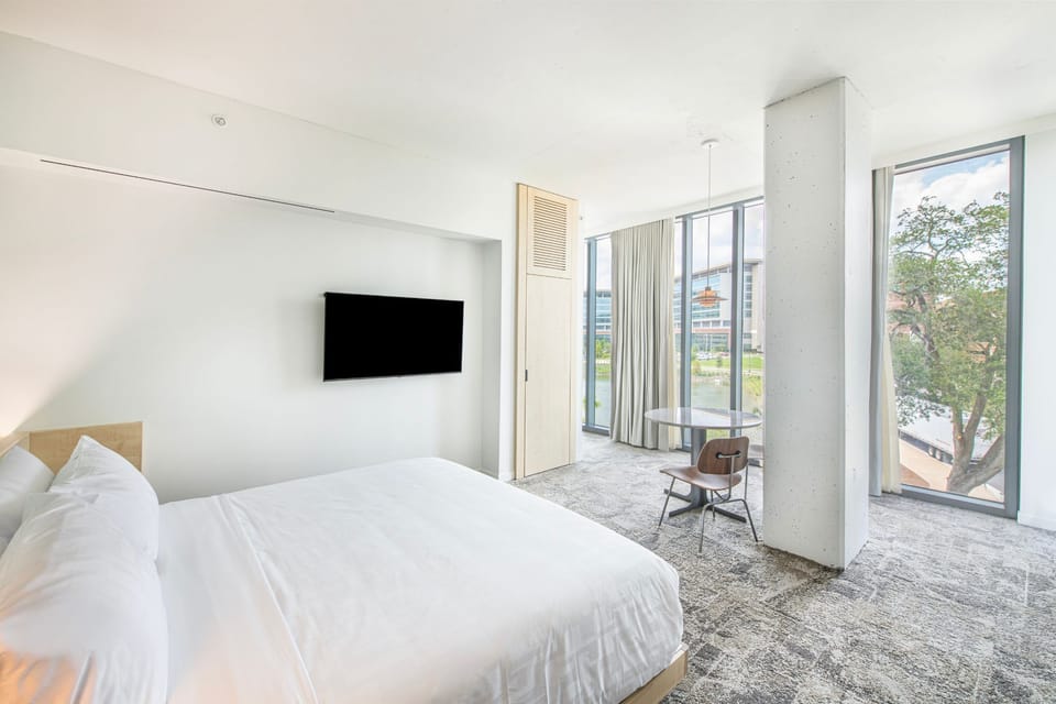 Experience ultimate comfort in the Lake View Suite, where modern design meets serene views, making your stay a restful retreat.