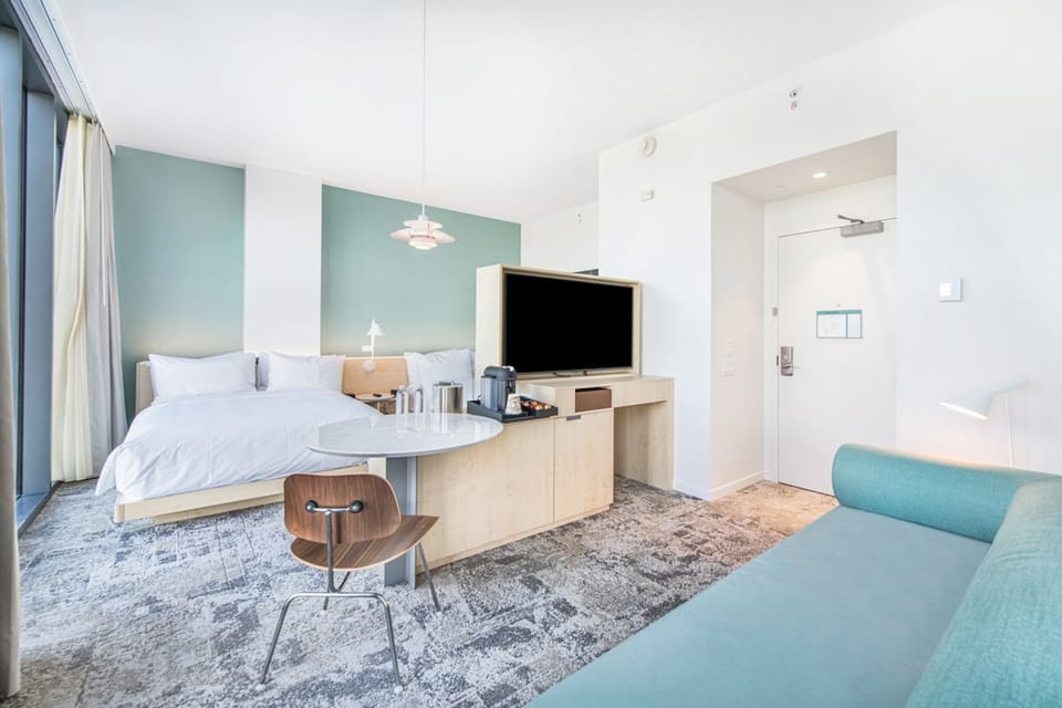 Featuring a modern design, this spacious guestroom combines accessibility with stylish elegance, providing an inviting atmosphere for all.