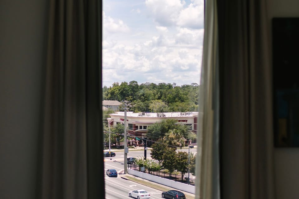 Experience unparalleled comfort and modern design in the City View Studio at Hotel Eleo, where captivating city views blend seamlessly with a serene atmosphere.