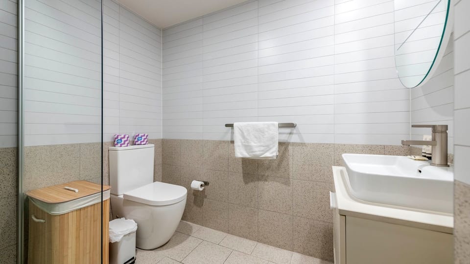 Clean and modern bathroom setup for a refreshing start to your day.