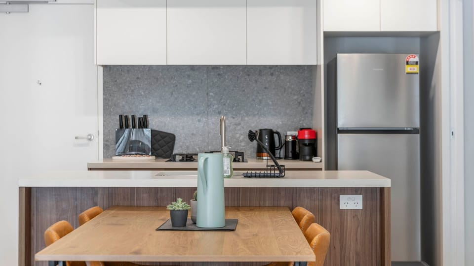 Bright, modern kitchen and dining space—perfect for cooking and gathering.