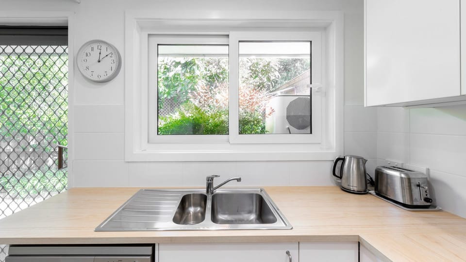 Bright kitchen with garden views