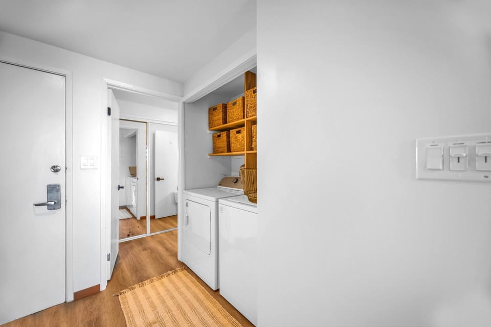 In-unit laundry keeps packing light, with a convenient washer and dryer tucked into a clean, easy-access space.