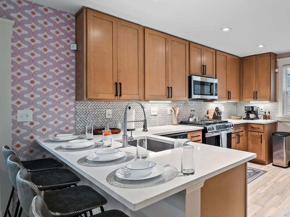 - Spacious kitchen with modern cabinets and light   - Airbnb friendly layout ideal for long stays   - Plenty of counter space for meal preparation  