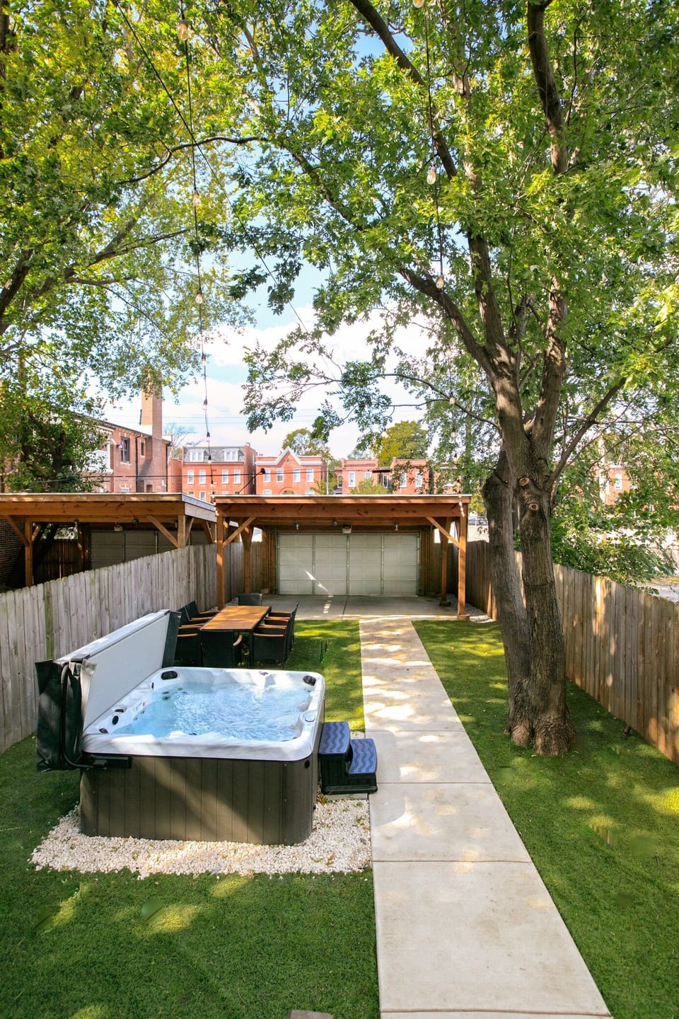 Backyard with dining area and Hot Tub!